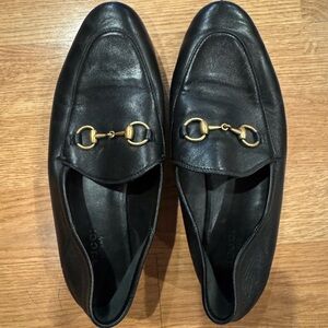 Gucci Black Leather Loafers with Gold Accents